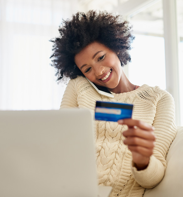 Gen Z female consumers purchasing from a laptop after experiencing affiliate personalisation and audience targeting.